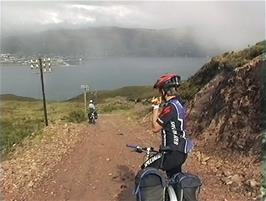 The track descent to Alltnaharrie Inn, 37.1 miles from Carn Dearg, with Ullapool visible on the far side of Loch Broom, 